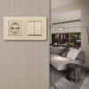 Выключатель двухклавишный с розеткой Arte Milano SET16-2-40-1-30-2 shampan